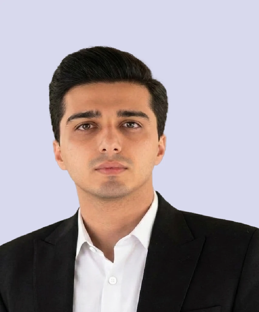 Professional portrait of Hassan Tariq, Digital Marketing Specialist at VisionTact, in formal business attire.